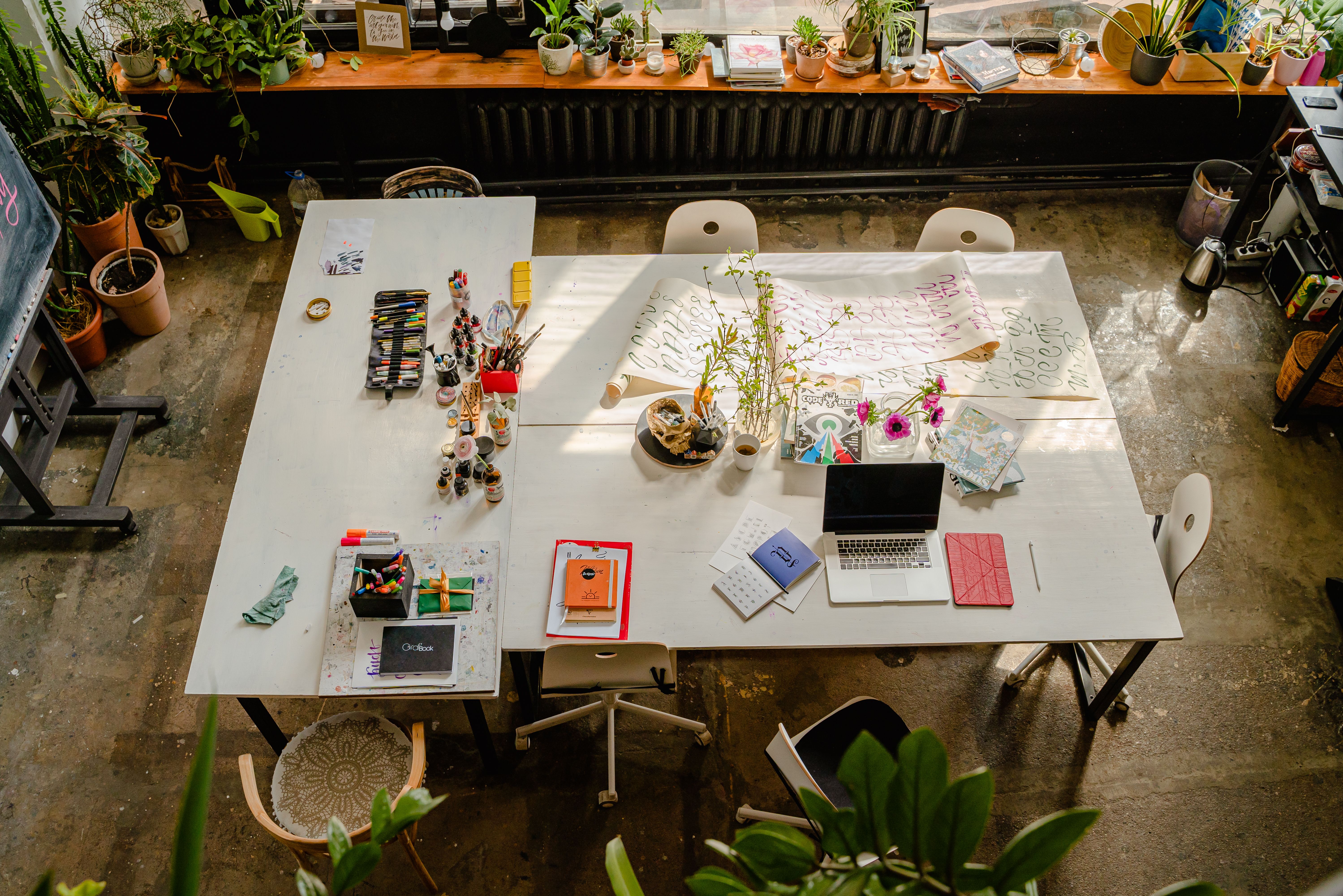 A collaborative tech startup office workspace, representing the agile, fast-paced environment suited for APM-certified project managers.